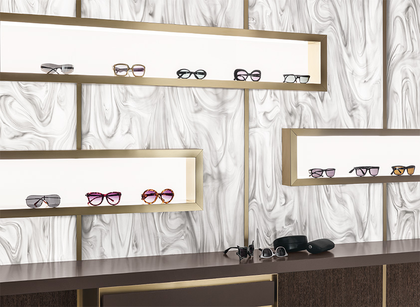 sites/corian.it/IMG/jpg/grey_onxy_backlit_eyeglass_store_3-3.jpg